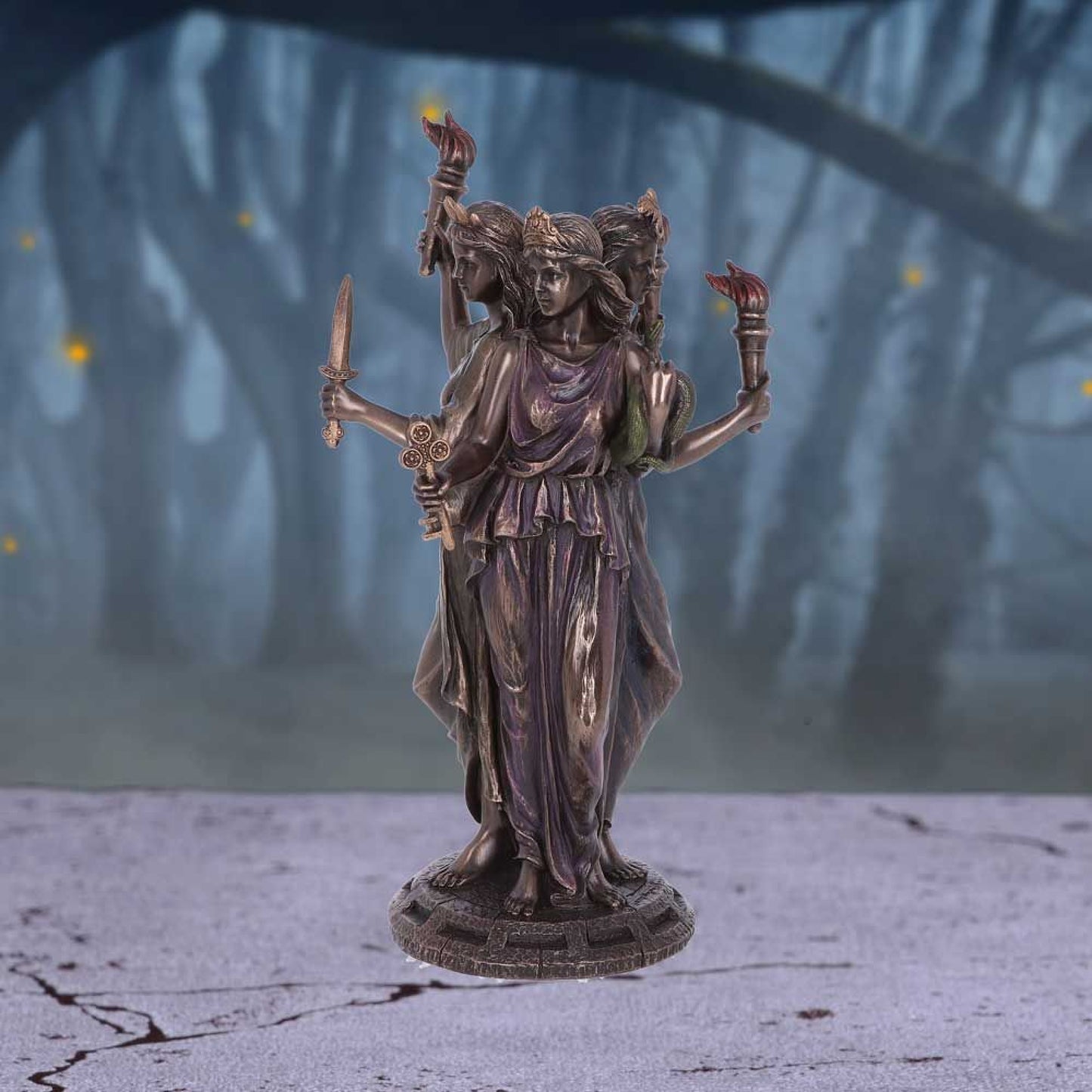 Hecate or Hekate is a goddess in ancient Greek religion and mythology, most often shown holding a pair of torches, a key, snakes or accompanied by dogs and in later periods, depicted in triple form as she is here in this beautiful figurine. She was the daughter of the Titans Perses and Asteria, and she was honoured in households as a protective goddess who brought prosperity.