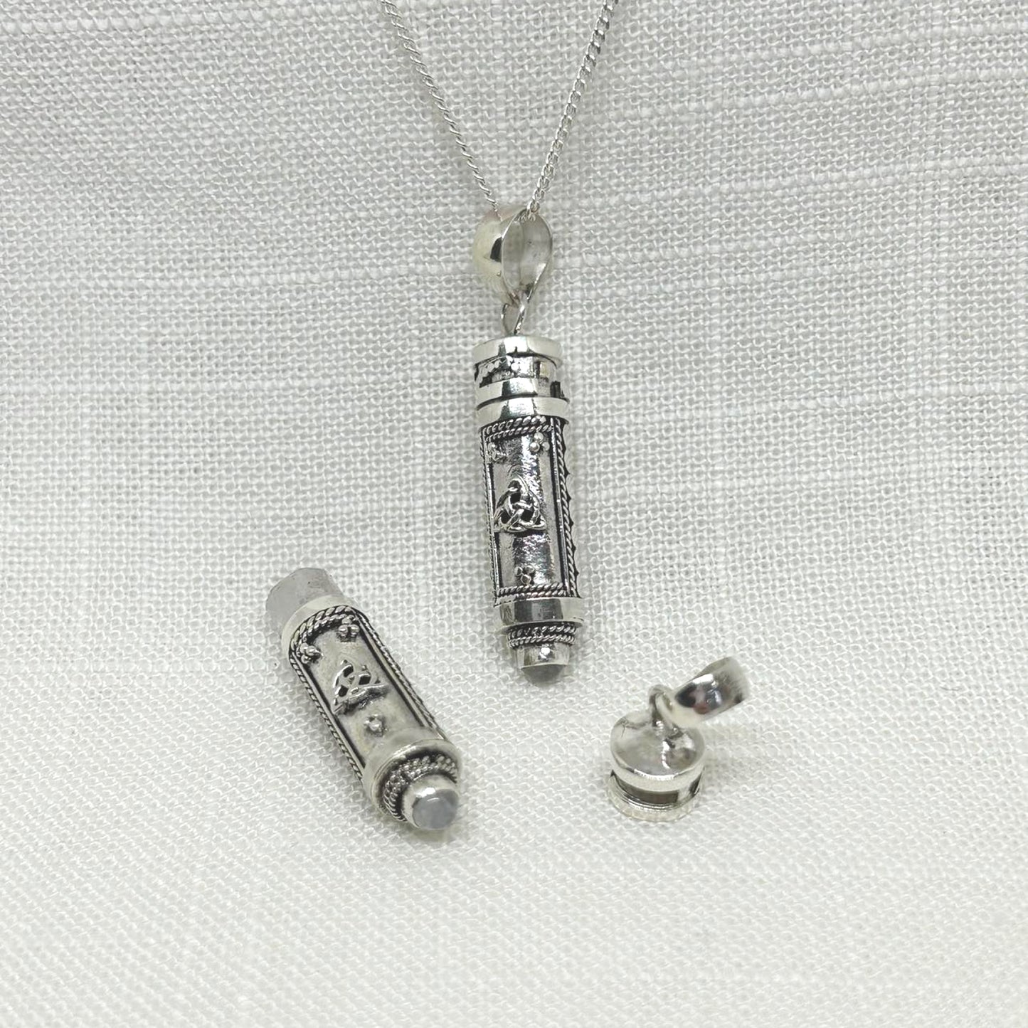 Detailed hand made locket is fully functioning for you to keep spells, perfume, ashes of loved ones etc inside for safe keeping. A 3D Celtic triquetra are on both front and back with detailed circles at sides. Approx length of locket is 4 cm.