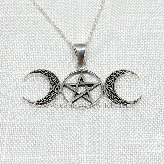 Set in 925 silver, with Celtic knot work detailing within the crescent moons sitting betwixt a full moon symbol. Inside the full moon holds a pentagram. The triple moon represents the triple aspect of the Goddess: Maid, Mother and Crone (life, death and rebirth). This pendant measures 4.5cm wide x 2.6cm high including the bale x 1mm thick and comes supplied on a 20" Sterling Silver chain, presented in a gift box.