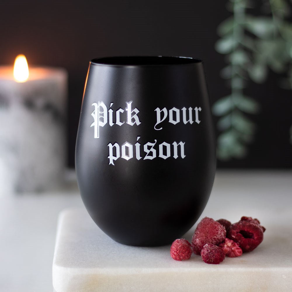 This Witchy Samhain/Halloween themed stemless wine glass features the text 'Pick Your Poison' in striking white text, standing out against the dark matte black glass. Ideal gift for any Witch! Holds 500ml Hand wash Only