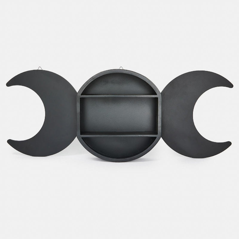 This black triple moon shelving display has the central moon as the storage area with two crescents either side which open out for display. A fantastic focal point for any room. Material: MDF Dimensions: H: 36cm x W: 93cm x D: 10cm