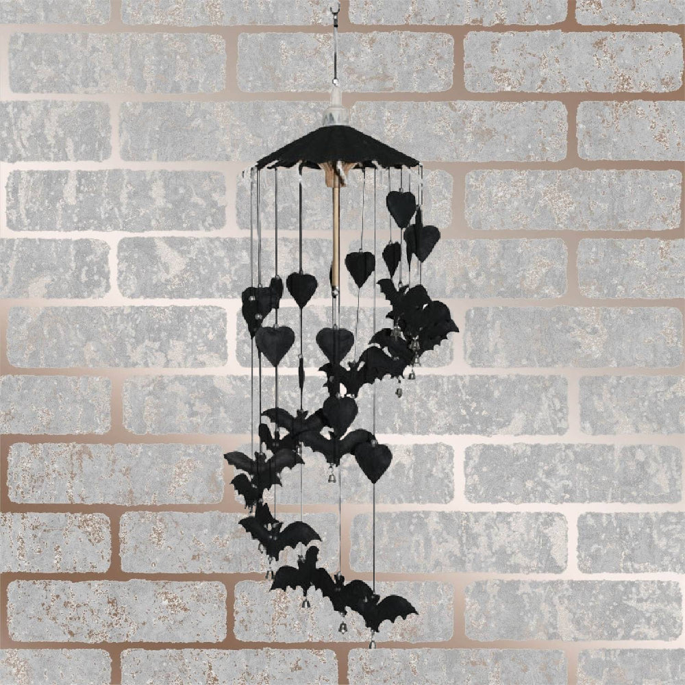 This SAA Mobile features a spooky paper black bat and hearts design, a perfect addition to any Gothic, Witchy or Samhain/Halloween home.  Little bells hang from the design, providing a gentle, tinkling sound when a breeze moves nearby.  Hang it in your home and enjoy a hauntingly beautiful touch of magical atmosphere.