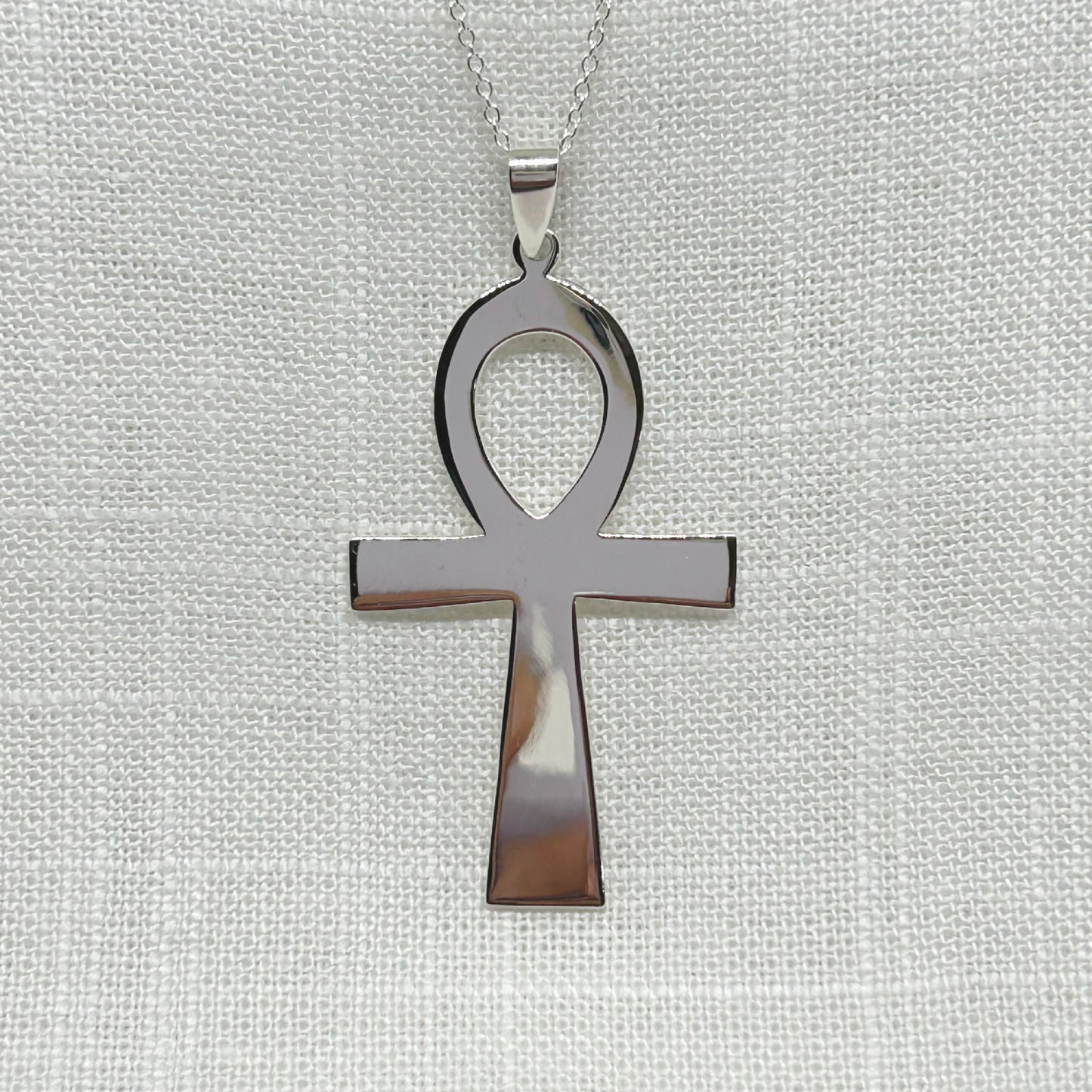 This beautiful extra large Ankh is highly polished and is approx 5.5cms long including the bale. Ankh Drop Earrings are also available. All pendants come supplied on a 20" 925 silver chain and arrives in a tarnish proof bag and gift box.