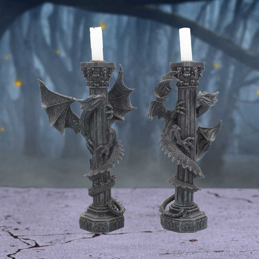 Ideal for the home of a fan of mythical creatures, this set of 2 candle holders expertly crafted from resin and hand painted offers a unique accent. The dragon figures, against a pair of baroque columns, twist their bodies around the posts with wings spread wide. Add a touch of atmosphere to any living or dining area - these eye-catching holders bring a subtle light and charm. 28cm tall