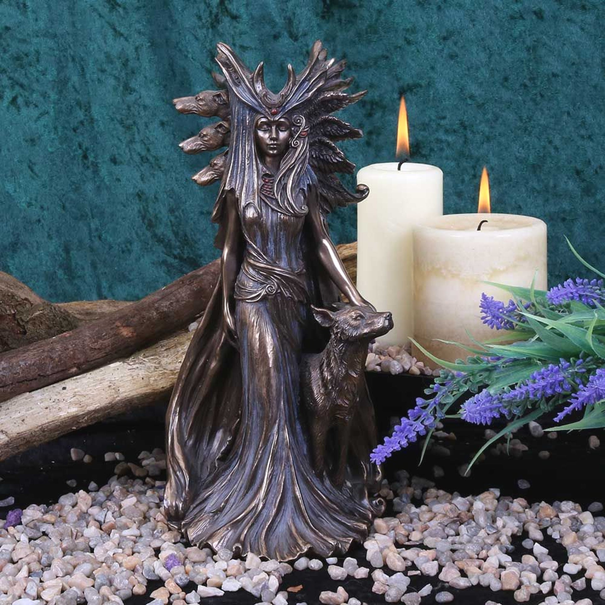 Marc Potts, the sculptor has imagined the essence of Hekate (or Hecate) beautifully with a long flowing dress and full length cape flowing behind her, a magnificent headdress, along with four faithful hounds. Figurine is 25cm tall