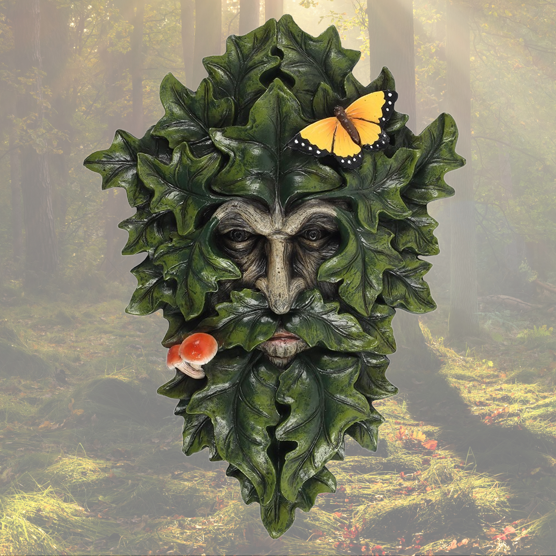 This strikingly handsome wall plaque of the Green Man is enhanced with butterfly and toadstool details. He would look eye-catching displayed indoors or out. The reverse of the plaque has a metal hook ready for hanging. Size: H: 29 x W: 21cm