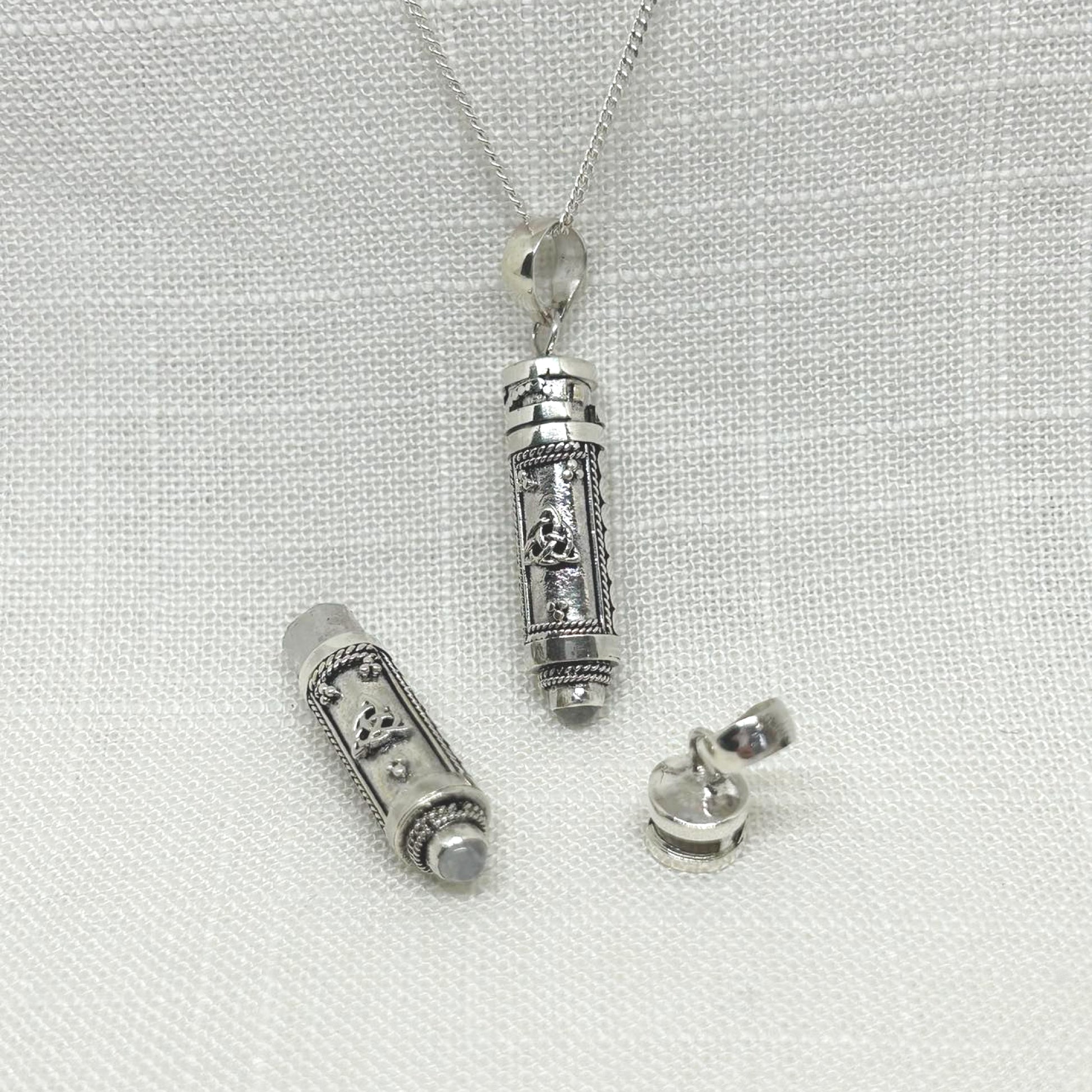 Detailed hand made locket is fully functioning for you to keep spells, perfume, ashes of loved ones etc inside for safe keeping. A 3D Celtic triquetra are on both front and back with detailed circles at sides. Approx length of locket is 4 cm.
