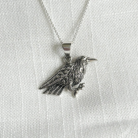Embrace the mystical allure of the raven with this stunning necklace.  The pendant is 3cm long (inc bale) by 3.2cm wide. Add it to your collection today and let the raven become your familiar.  All pendants come supplied on a 20 inch Sterling Silver Curb Chain and arrive gift boxed.