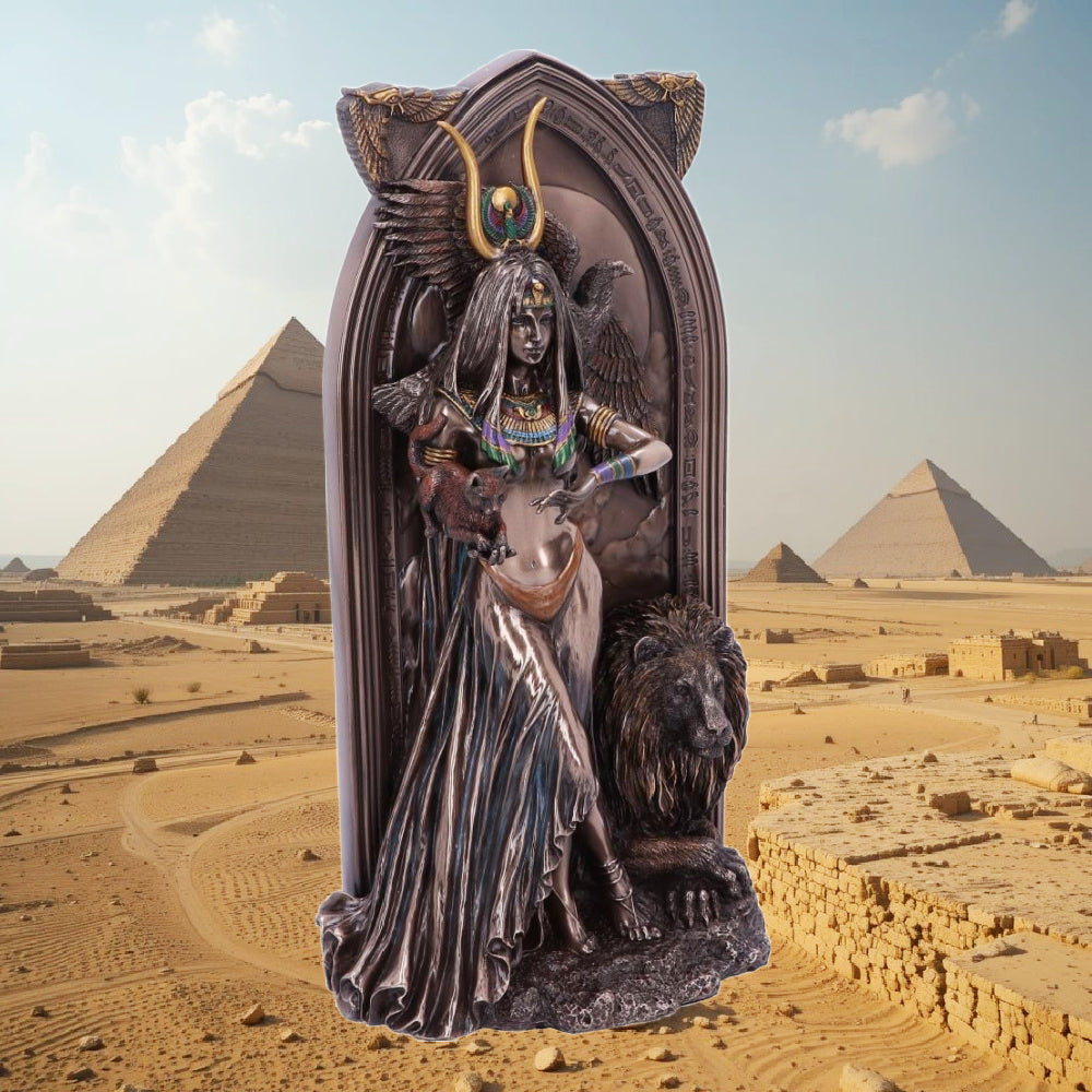 An ancient Egyptian Priestess wearing a distinct headpiece, an usekh collar, multiple armbands and bracelets with a flowing sheer skirt. A ferocious lion sits at her side, a majestic eagle perches on her shoulder as she cradles a cat in he arms. Perfect for those infatuated by ancient Egyptian culture, this fantastic Priestess figurine is the perfect centre piece for any altar or coffee table.