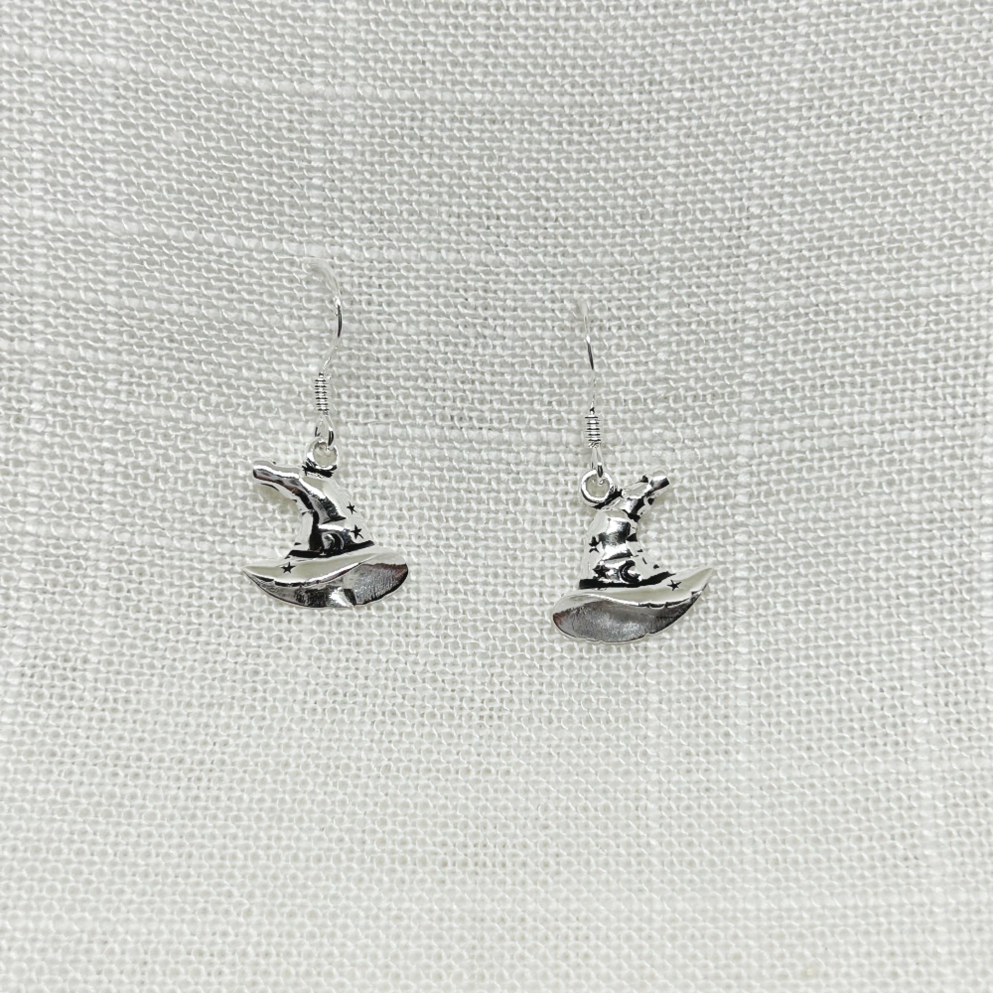 Decorated with moon and stars, these super cute witch hat earrings are beautifully designed with the witch of today in mind. These are 2.5cm long including the hooks and arrive in a tarnish proof bag inside a gift box. Matching necklace is also available.