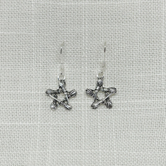 These 3D pentagram earrings are 2.75cm including the hooks and are a nice sturdy weight at 1gram each. The 5 besoms (pronounced 'bee-som' is a traditional Witches' broomstick) have been slightly oxidized to show the detailing. The matching necklace can be bought separately Earrings are non returnable due to hygiene reasons.
