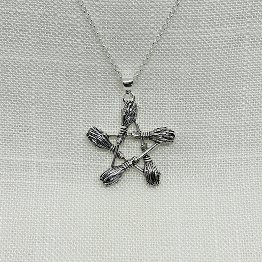 This pentagram pendant is just over 3cm long including the bale.   The 5 besoms (pronounced 'bee-som' is a traditional Witches' broomstick) have been slightly oxidized to show the detailing.   The pendant comes complete on a 20" sterling silver chain and arrive in a tarnish proof bag inside a gift box.  Matching drop earrings are available to buy separately