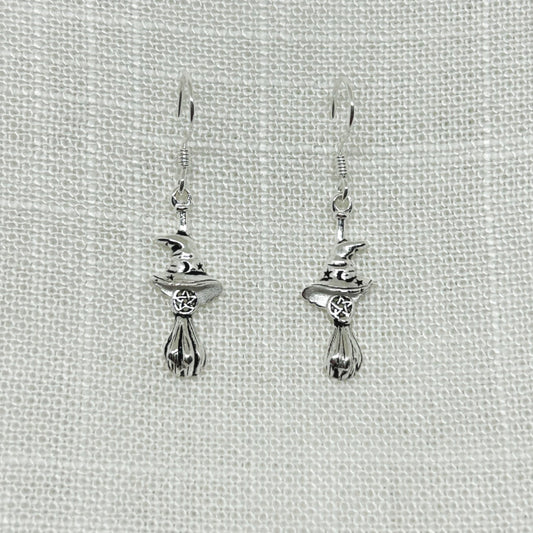 These Witches besom and pentacle earrings are approximately 2cm long excluding hooks x 6mm wide at brim of hat. They have amazing detail with a pentacle and a Witches hat decorated with moon and stars set within it Matching necklace is also available