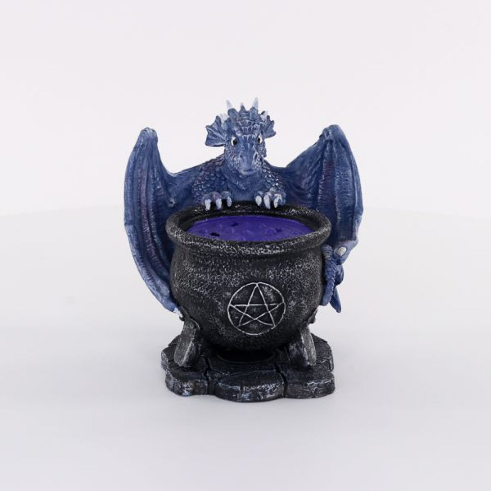 Designed by Anne Stokes, this eye-catching incense cone burner features a blue dragon looking into a bubbling cauldron. When an incense cone is lit and placed inside the smoke from the cone will flow through the top of the burner for an impressive feature piece. 