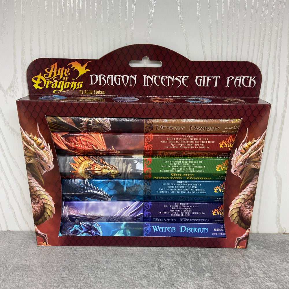 A gift pack from the Age of Dragons by Anne Stokes incense range. It includes one hexagonal pack of each Dragon incense, six in total and features Anne's amazing dragon art of elemental dragons. Each hexagonal pack contains 20 sticks of incense that will fill your home with beautiful scents.  The scents include: Desert Dragon ~ Sandalwood Fire Dragon ~ Dragons Blood Rock Dragon ~ Frankincense & Myrrh Water Dragon ~ Patchouli Golden Mountain Dragon ~ Opium Silver Dragon ~ White Musk
