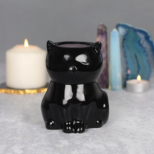 A lovely glossy black cat oil burner which would make a fantastic gift for anyone with a love for cats. When not in use, this item also looks fantastic as an ornament in the home. Part of the popular Black Magic Collection. These burners are compatible with wax melts and fragrance oils (sold separately).