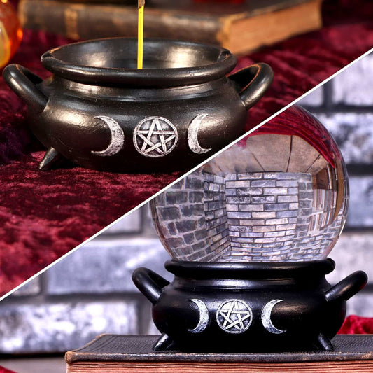 With a small space in the centre to hold your favourite incense stick, this cauldron has a matte black finish and features a silver triple moon symbol with a pentagram within it's centre. This versatile piece can also be used for holding an 11cm crystal ball.  Cast in the finest resin, this piece would make the perfect addition to any altar or living space. Size: 13cm
