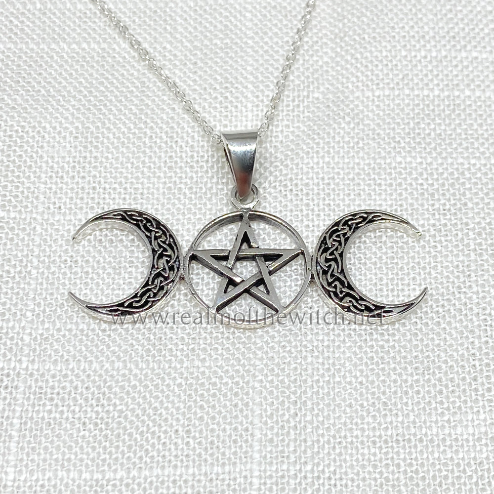 Set in 925 silver, with Celtic knot work detailing within the crescent moons sitting betwixt a full moon symbol. Inside the full moon holds a pentagram. The triple moon represents the triple aspect of the Goddess: Maid, Mother and Crone (life, death and rebirth). This pendant measures 4.5cm wide x 2.6cm high including the bale x 1mm thick and comes supplied on a 20" Sterling Silver chain, presented in a gift box.
