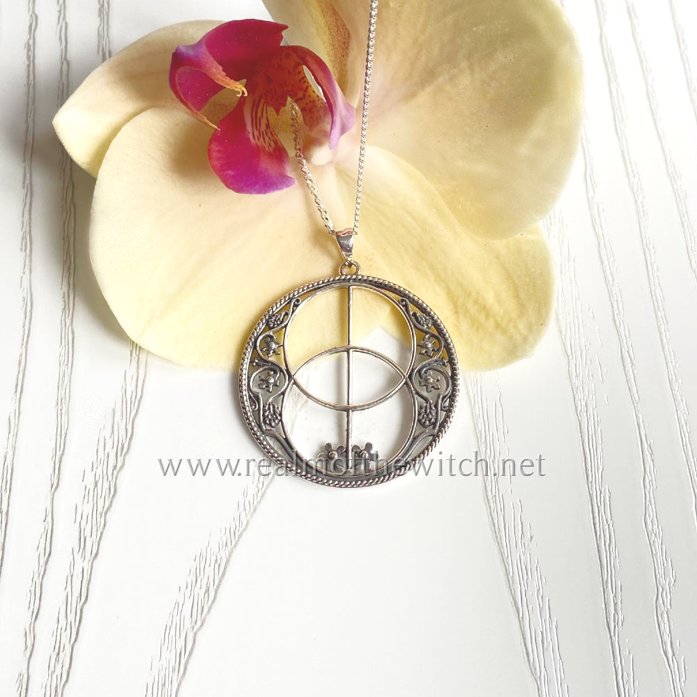 A stunning extra large pendant set in .925 silver of the Glastonbury Chalice Well Cover. The size of this pendant is approx 3.4cm in diameter. It comes on a 20" sterling silver chain and all jewellery comes gift boxed. RRP £55.46 Also available on the website is the small size necklace of the same design.