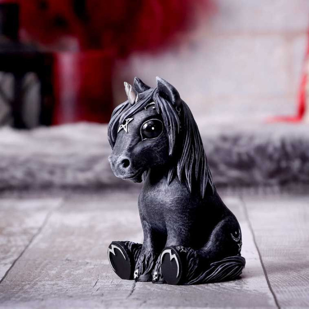 Resembling a unicorn, this cutie sits peacefully, decorated in ornate silver detailing and occult symbology. Cast in the finest resin before being expertly hand-painted, this Culticorn is likely to be the cutest occultist you've ever seen. 10.2cm tall