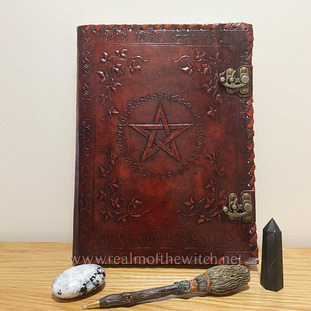 Bound in brown leather, the book comes with two metal clasps, keeping it from falling open unexpectedly. The cover is embossed with a large pentagram at the centre, that is bordered by intricate floral triquetra patterns. Inside, high-quality plain paper gives you the freedom to record your thoughts and dreams unimpeded. RRP 65.99