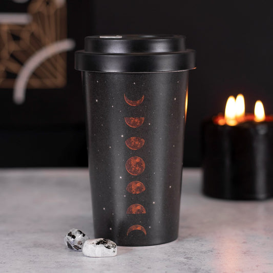 This eco-friendly, reusable travel mug is made out of durable bamboo fibre and comes with a matching silicone sleeve and lid for keeping hydrated (and caffeinated) on the go. This celestial style features a moon phase design and also includes a convenient stopper to prevent accidental spills. Dishwasher safe mug with hand wash only lid and sleeve. Do not microwave.