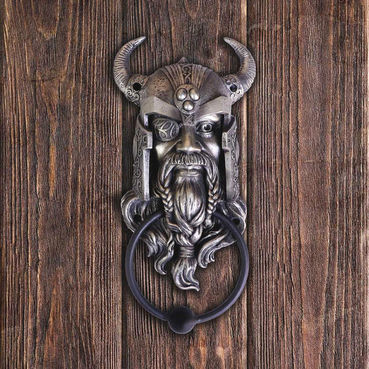 This magnificent sculpture would take pride of place on anyone's front door! Odin, the All Father, Norse God of wisdom, magic, war as well as bloodshed. He has a long beard and moustache, plaited together below his chin. One of his eyes has a patch on from when he sacrificed it  in Mimir’s well and he threw himself on his spear Gungnir in a kind of symbolic, ritual suicide. 