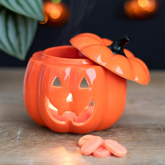 This super spooky orange Jack-O-Lantern oil burner will set the mood perfectly this Halloween. With a cut out smiling face, he will look adorable in any living room or hallway. Use the lid for when you've finished warming your favourite fragrance oils or wax melts, keeping the fragrances fresher for next time. These burners are compatible with wax melts and fragrance oils (sold separately).
