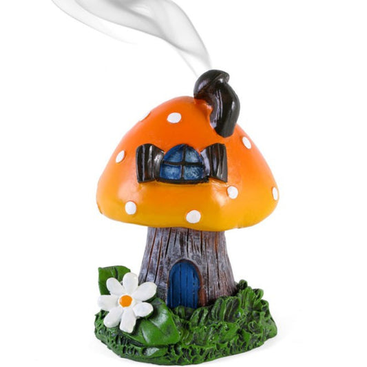 An orange toadstool house design incense cone burner. When the cone is burning, the smoke rises through the chimney of the item. Designed by Lisa Parker.   Size H: 12cm x W: 8cm x D: 8cm