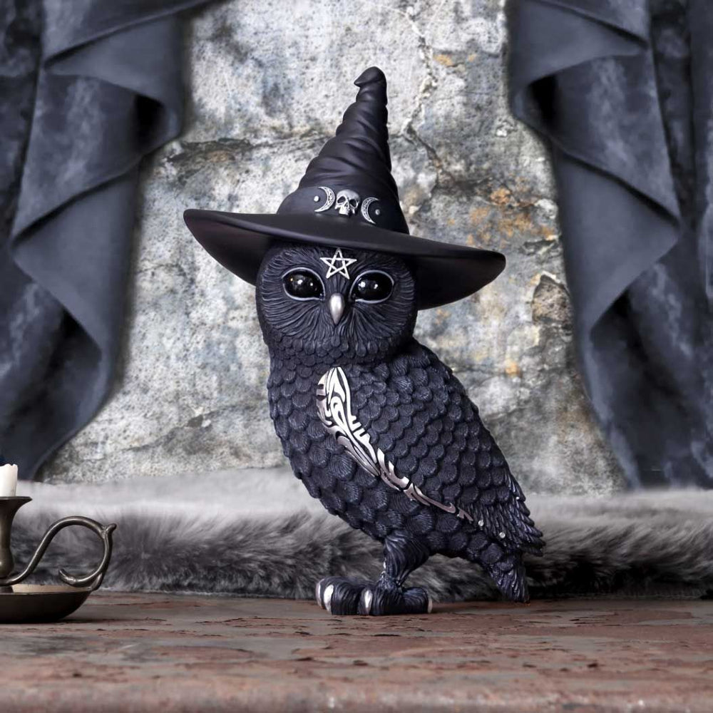 This cult cutie owl is decorated in ornate silver detailing and occult symbols. Cast in quality resin and hand-painted. Alongside Purrah, the Witch Cat, this pair will add a magical addition to any home. 30cm high