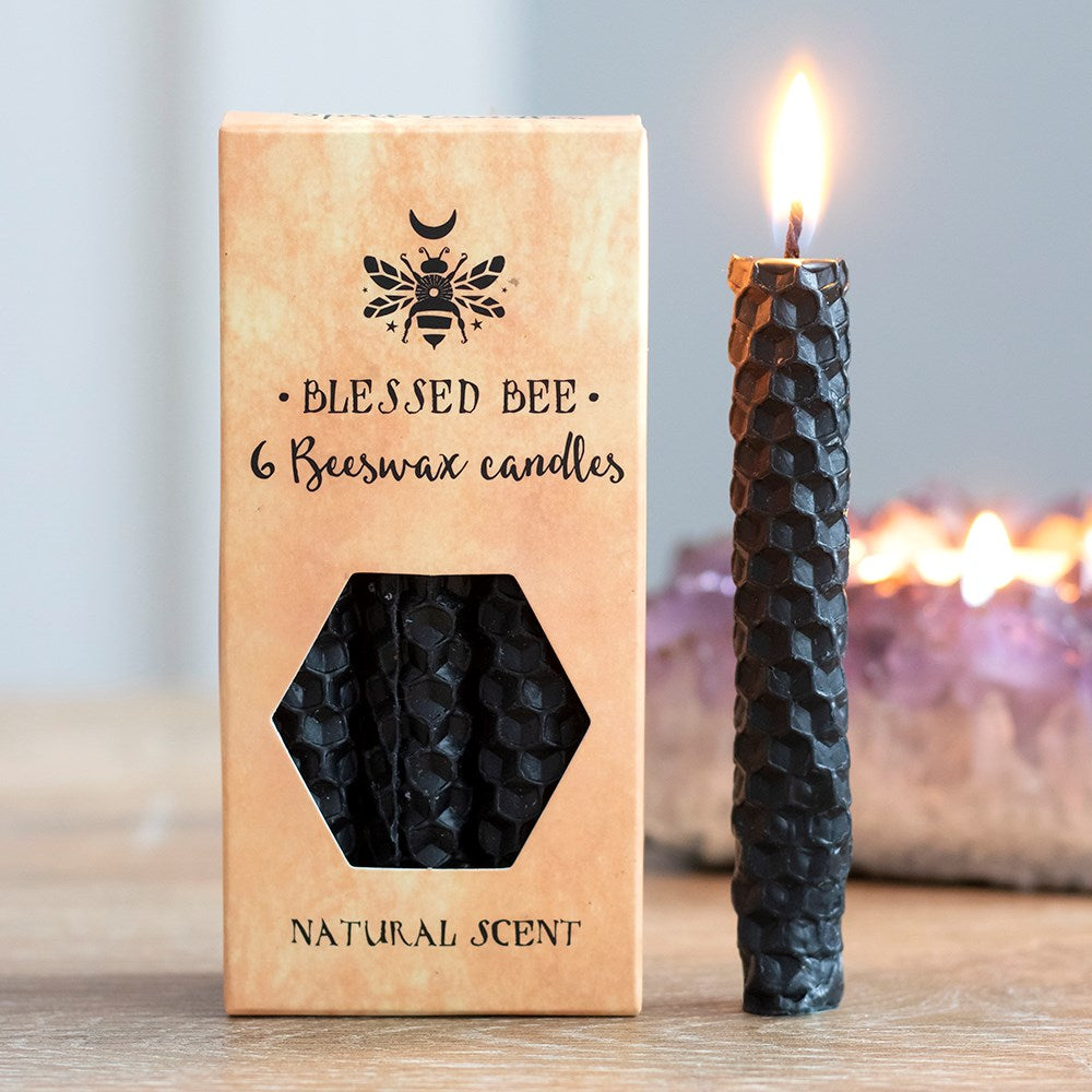 A box of 6 black Blessed Bee beeswax candles useful for spell-work involving protection and banishing negativity. Candle magic is one of the easiest forms of spell casting in which the caster decides on a goal, while visualising the end result and focuses intent or will to manifest that result. The caster will usually write down their intent on a piece of paper the same colour as the candle and burn the paper in a fire safe bowl.