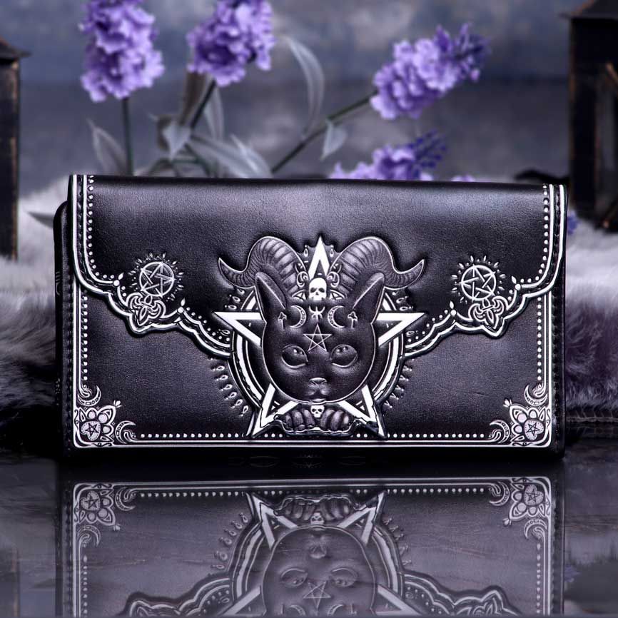 Now you can carry Pawzuph the Baphomet cat, with you everywhere you go! He now appears on this beautiful black purse with silver decoration. Just below each of his ears and horns, is a crescent moon and on his forehead (the third eye area) is a pentagram. Around the edges of the purse are pentacles, fleur de lis and skulls. The back and side of the purse features a pentagram along with four more little skulls, one on each corner. 