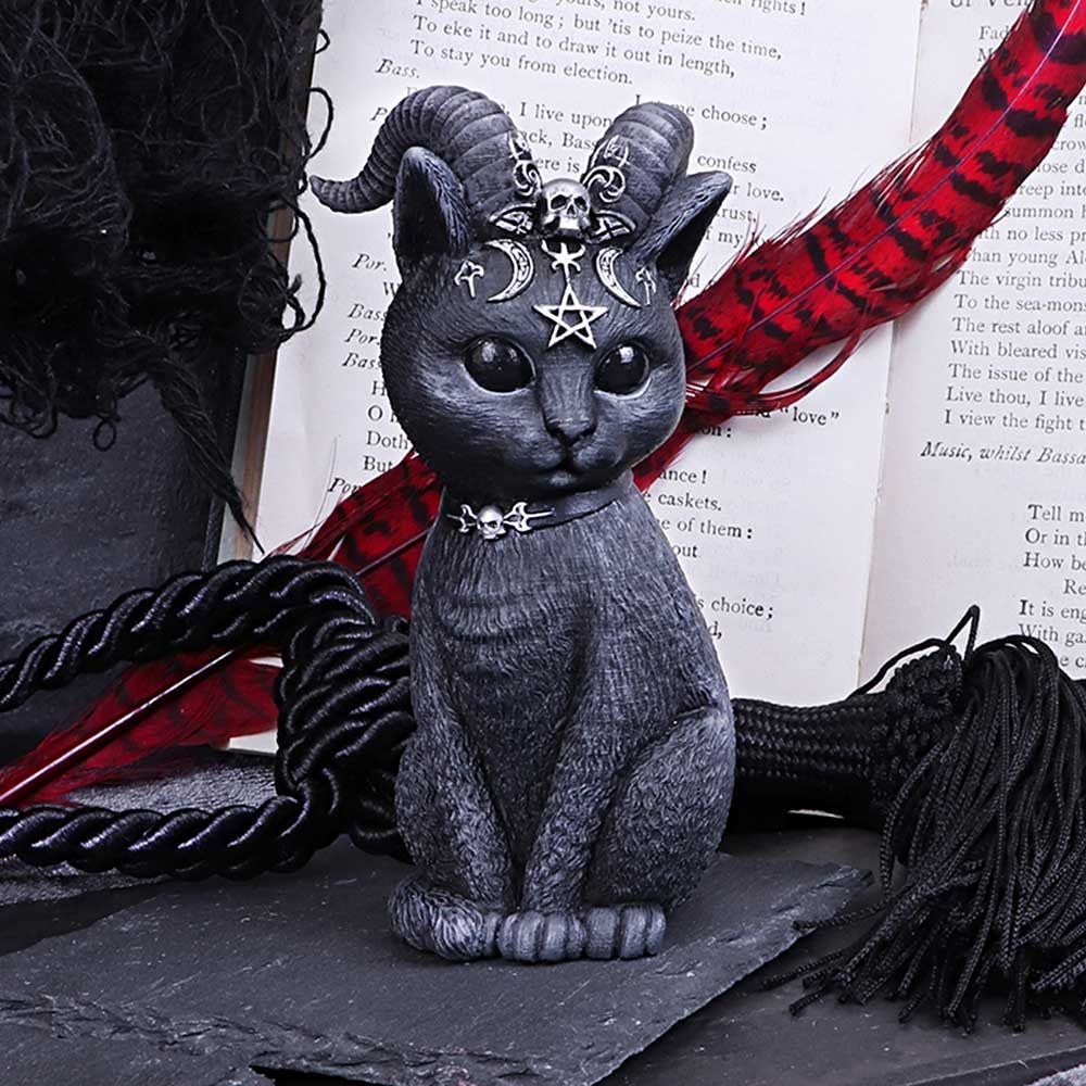 Inside this cat appears to be the spirit of Baphomet, encapsulated by goat horns and satanic symbology. Cast in high-quality resin and carefully hand-painted this figurine is likely to be the cutest occultist you've ever seen. Alongside the Bat Cat, this amalgamation of horror and delight will make the perfect addition to any feline fanatic's collection. 11cm tall