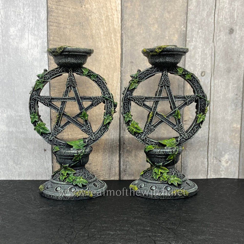 These candlesticks rise to include a circle enclosing a pentagram with lichen and tendrils of ivy. Celtic patterns climb up the outside, with the phases of the moon being shown in the base. Perfect for a dining table, a bedroom, or an altar, or for simply turning down the lights and setting a more relaxed mood, this set of 2 candlestick holders are a wonderful gift for the mystic or romantic in your life.