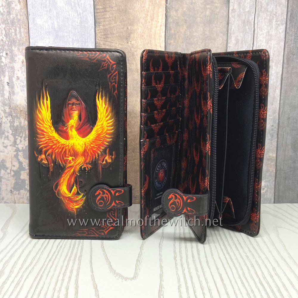 Within the darkness, a red-cloaked enchantress summons the spirit of the Phoenix with her outstretched hands. The beautiful embossed detailing enhances the magic and creates a striking 3D effect while the large compartments make it a wonderfully practical piece.  Material: Faux Leather. Size 18.5cm