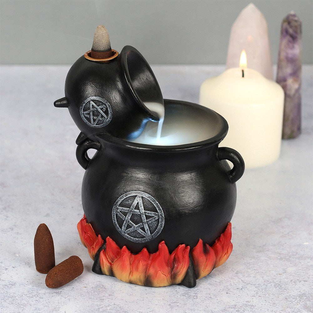 Place a backflow incense cone on top of this beautiful resin cauldron burner and watch the smoke gently pour between cauldrons. Accented by flames and a distressed silver-effect pentagram design and finished with a light to create an outstanding smoke effect. Powered by 2 AA batteries (not supplied) and an on/off switch.