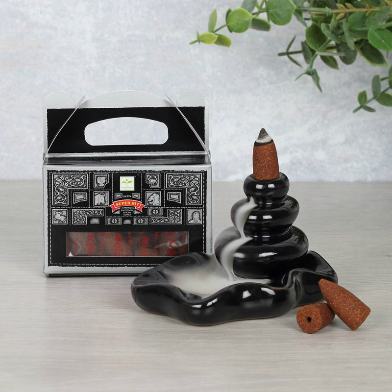 These beautifully scented Super hit backflow incense cones are developed by Satya. The cones are crafted using the highest quality ingredients to offer long-lasting fragrance. Use these cones with a backflow incense burner to create stunning smoke displays. Each box contains 24 backflow cones.