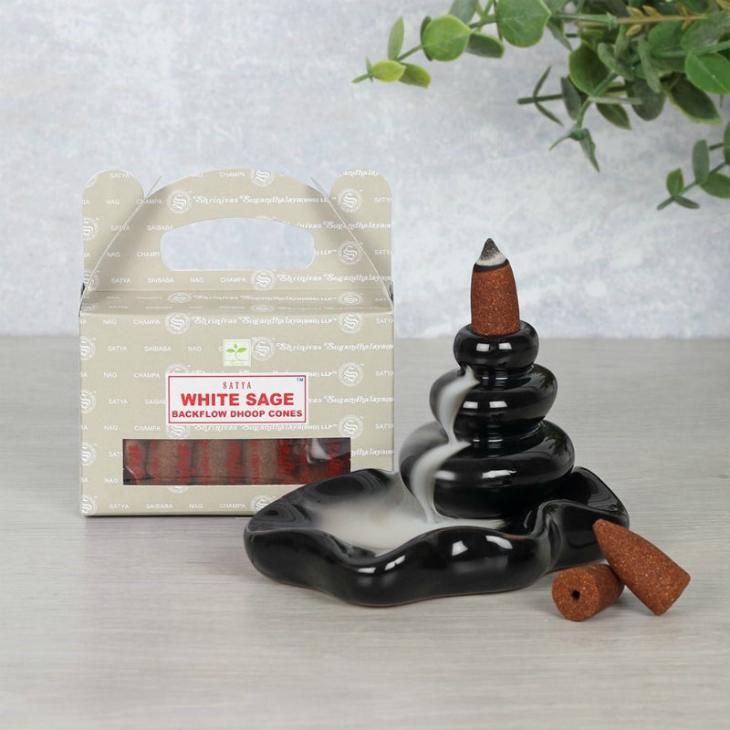 These beautifully scented White Sage backflow incense cones are developed by Satya. The cones are crafted using the highest quality ingredients to offer long lasting fragrance. Use these cones with a backflow incense burner to create stunning smoke displays.