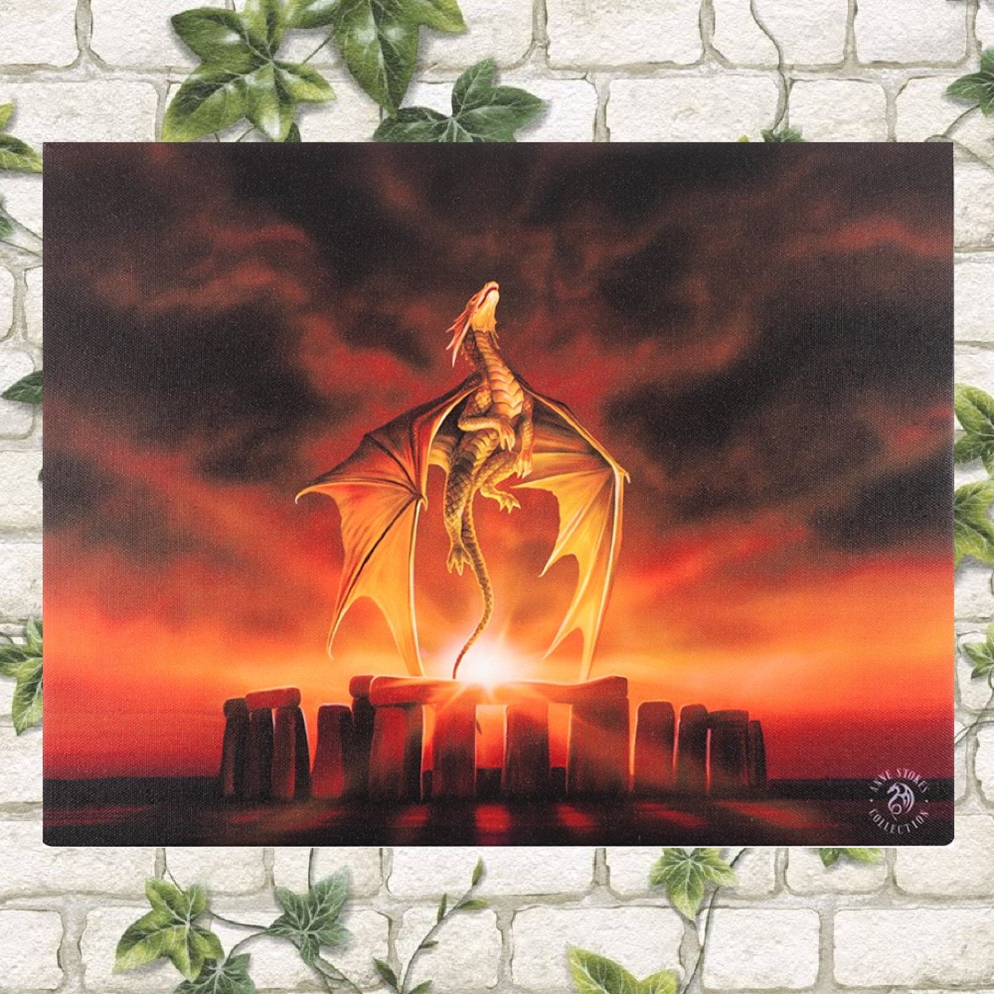 A stunning 25 x 19cm wall canvas featuring the Solstice Dragon, rising above Stonehenge design by licensed artist Anne Stokes.