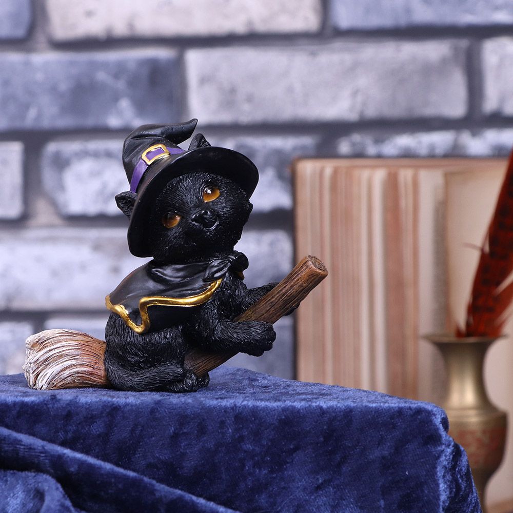 This sweetest little cat figurine is cast in high-quality resin before being hand-painted. Tabitha is feeling playful while clasping a small broom. With a black Witches hat on her head, she is ready to take flight making this the perfect gift for the witch in your life.