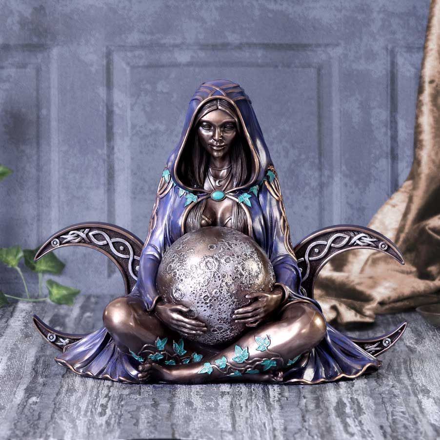 Wearing a purple hooded cloak, this goddess sits between two crescent moons. With a full moon place in her lap and foliage wrapped around her. This triple moon goddess has been cast in the finest resin and painted by hand. Size 36cm