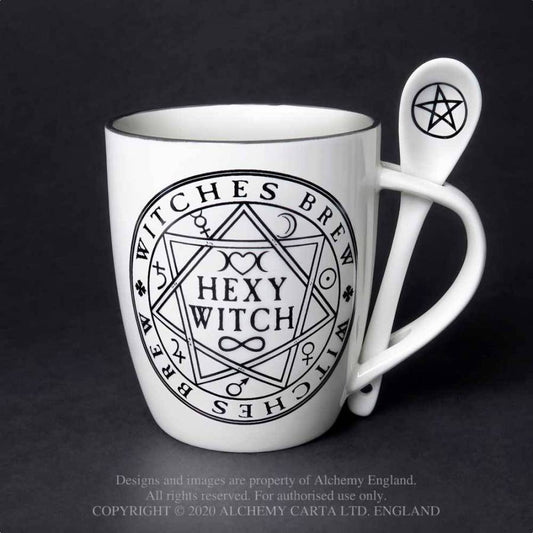 This 'Hexy Witch' mug and spoon set is the perfect gift for that tea or coffee loving friend! Or maybe a little treat just for you, it will truly serve you a fiendishly good brew! This extraordinary mug and spoon set forms part of the exciting Home & Gift Collection by Alchemy. 