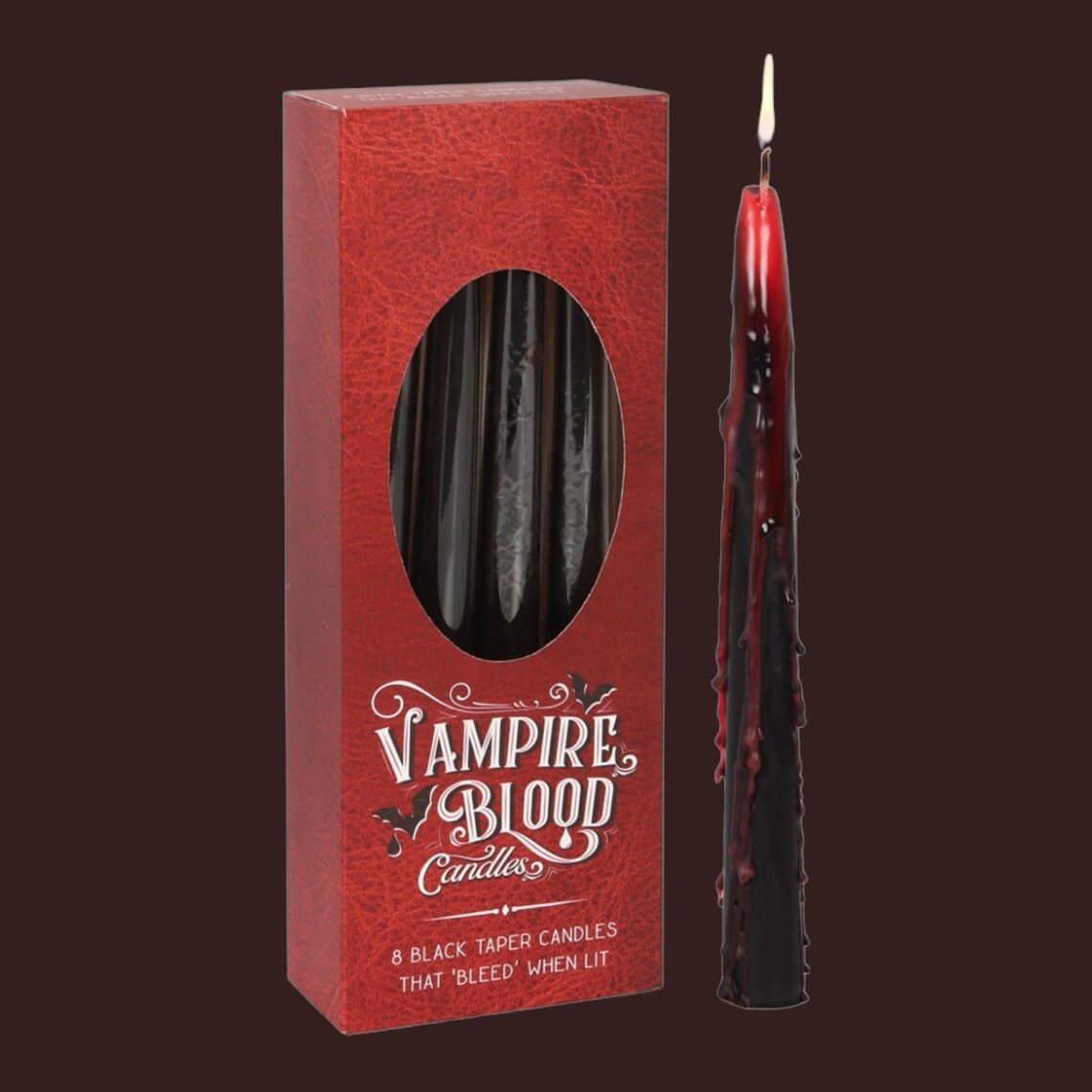 From candlelit dinners to eerie mood lighting, our Vampire Blood taper candles will entrance guests with their eye catching, bleeding wax effect.  Place these black and red candlesticks in an ornate candelabra for a truly bewitching display when the warm wax bleeds down its sides.  Sold in boxes of 8. Approximately 2 hour burn time per candle.  Size: H: 25.5cm x W: 9cm x D: 4.5cm